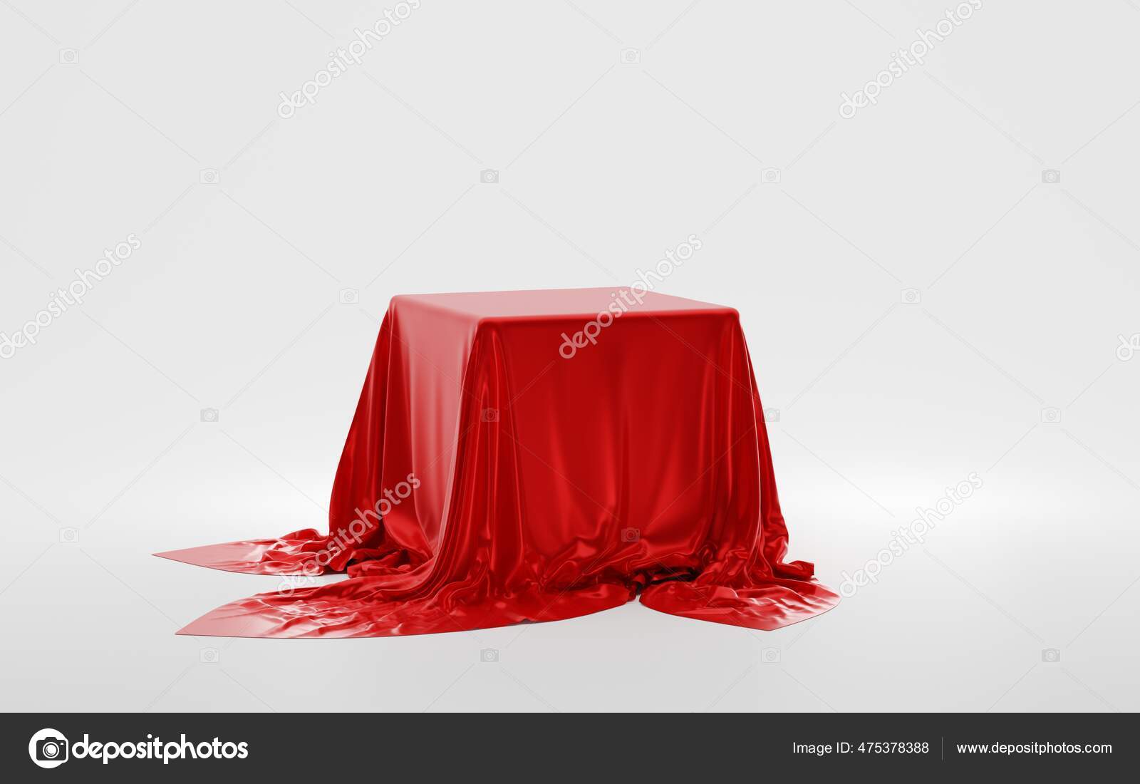 Cube or box covered with red silk cloth isolated on white background.  Secret gift, hidden under